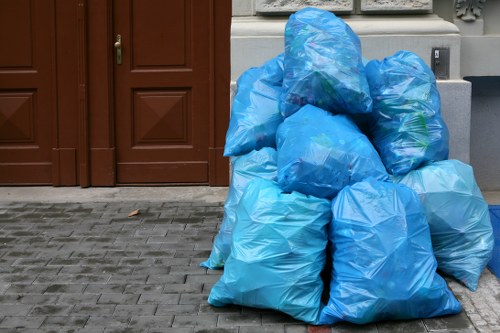 Workers handling household items carefully during a Wandsworth house clearance